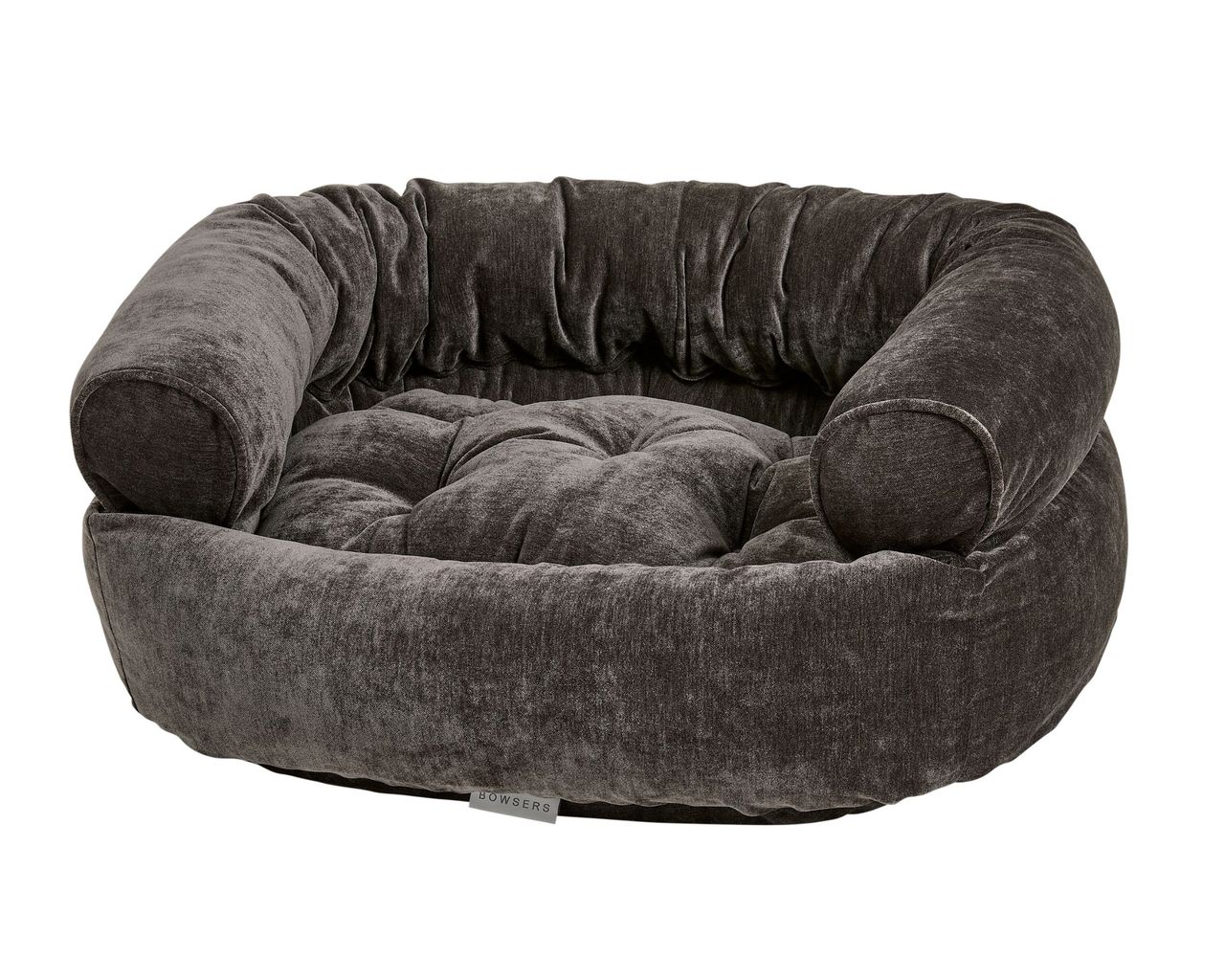 Round grey plush pet bed with cushioned sides and tufted interior, for dogs or cats.**Note: concise**