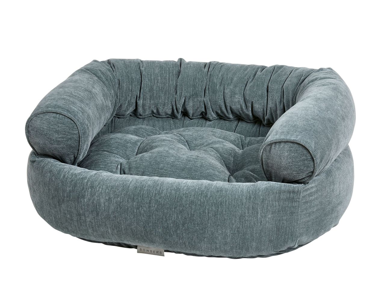 Round, tufted blue-gray pet bed with cushioned sides and a soft, plush interior.
