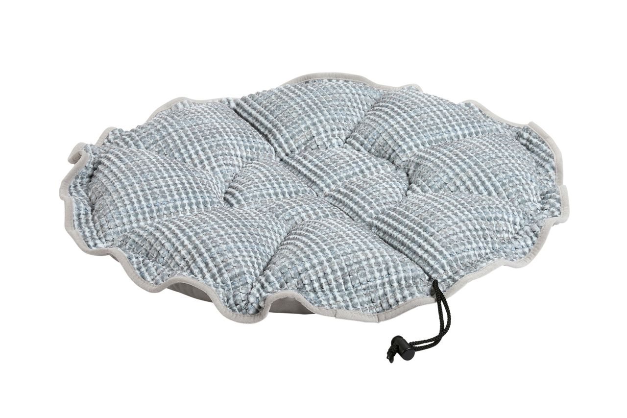 Round, padded pet bed with a blue-gray quilted surface and a beige edge, featuring a drawstring fastener.