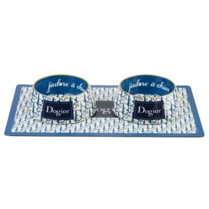 Two blue patterned dog bowls sit on a matching blue mat with branding on the front.