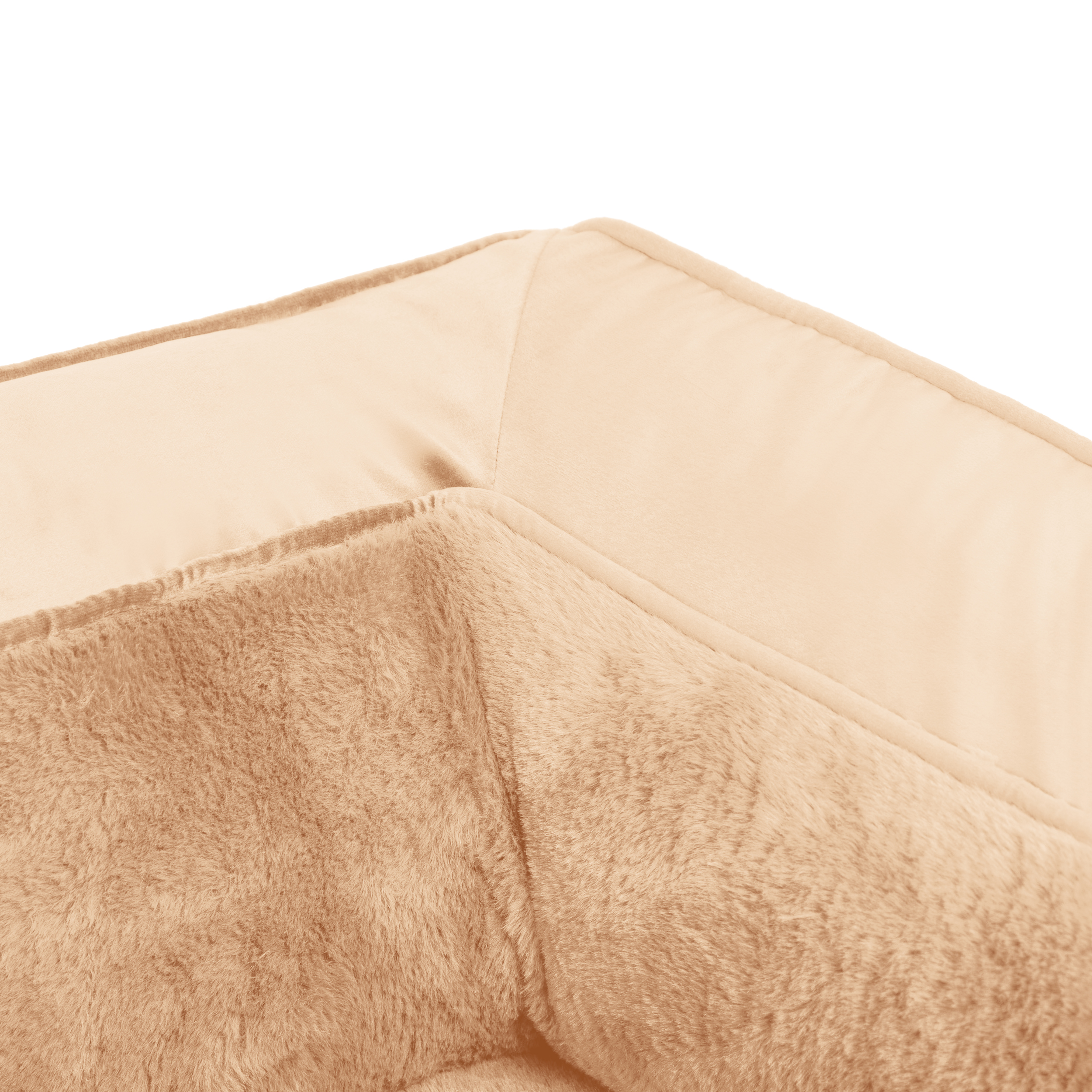 Close-up of beige plush fabric with a visible stitched seam running diagonally across the image.