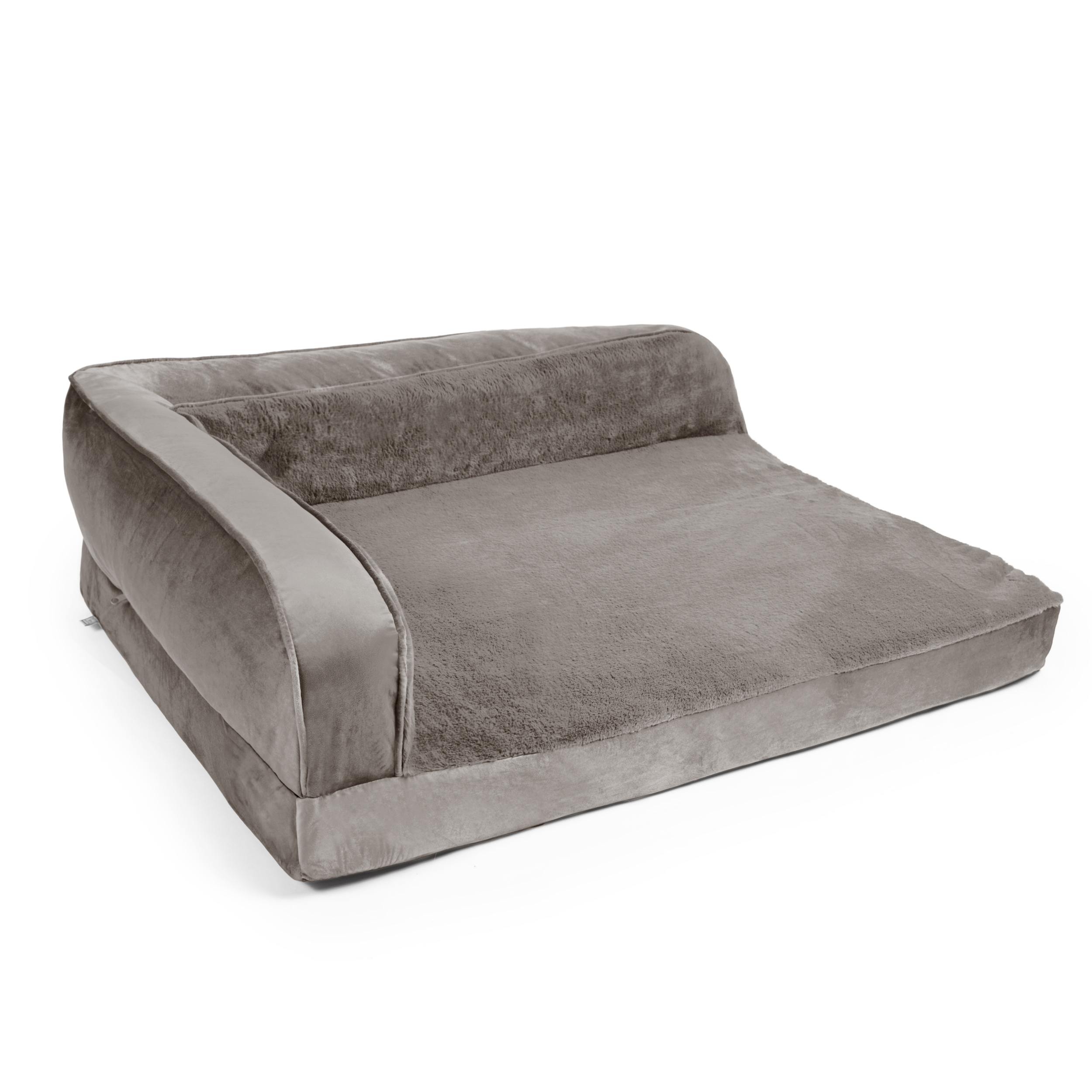 Soft brown upholstered sofa with plush fabric and rounded armrest (close-up).