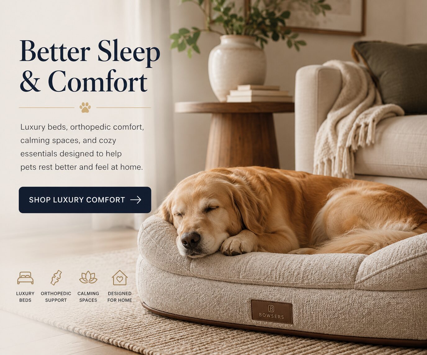 Golden retriever sleeping on a plush beige dog bed in a cozy living room, with a sofa and blanket nearby.