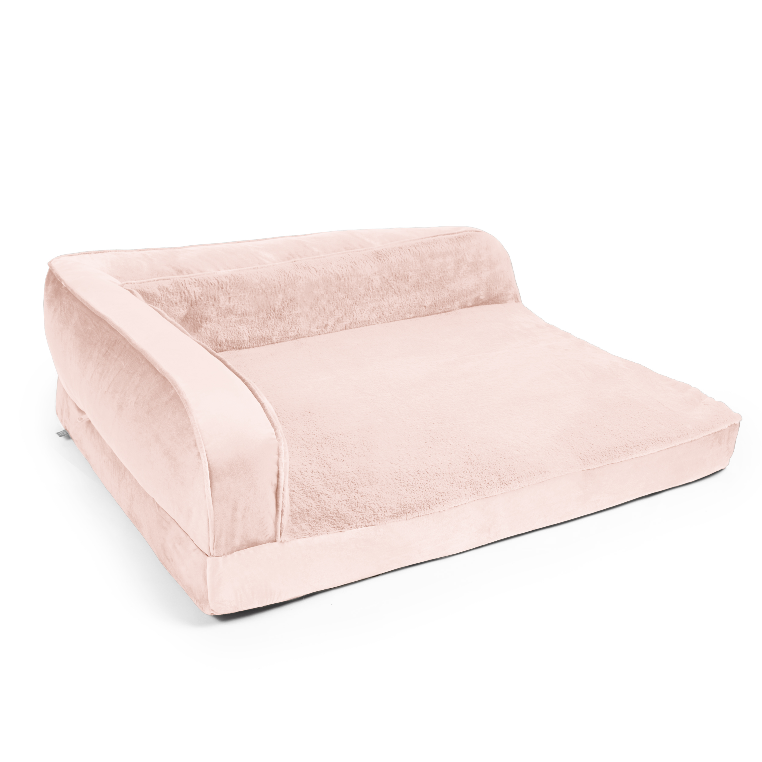 Light pink upholstered sofa with rounded armrests photographed against a white background.