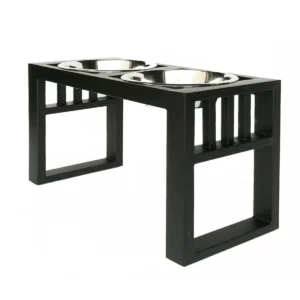 Black elevated pet feeder with two stainless steel bowls placed on top.