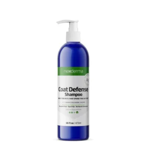 Blue bottle with pump labeled 'Nexderma Coat Defense Shampoo' for pets, 16 oz (473 ml).