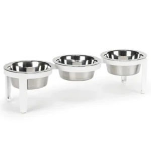 Three stainless steel pet bowls on a white elevated stand, for feeding pets.